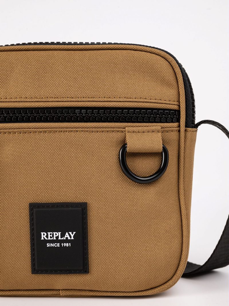 bag with branded shoulder strap