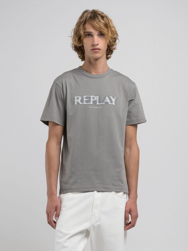 grey military t shirt with blurry lettering