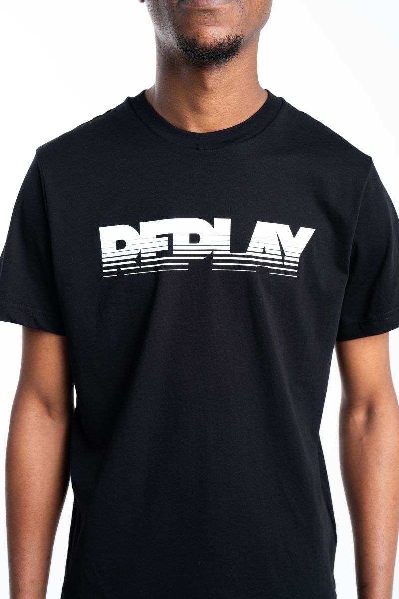 black cotton t shirt with faded white lettering